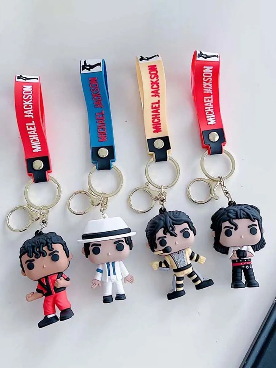 A set of Michael Jackson music icon keychains featuring various characters and names on colorful metal buckles.