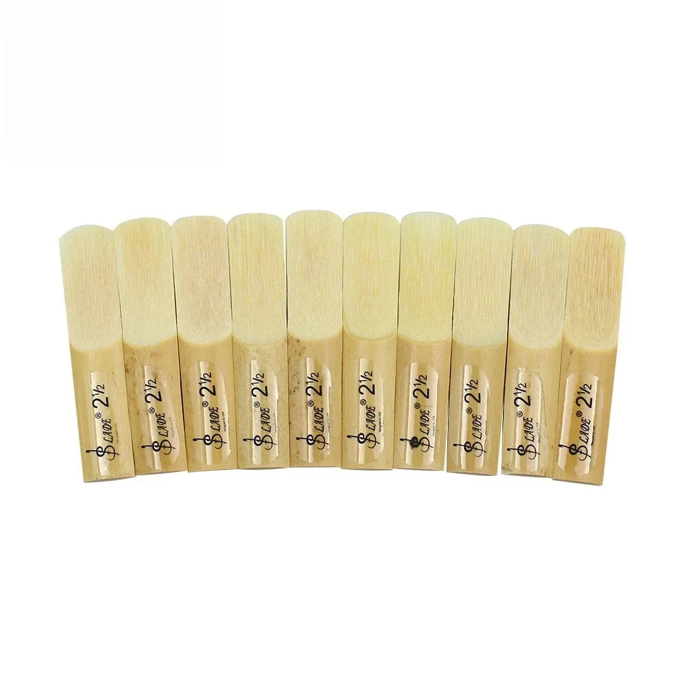 A pack of ten natural wood clarinet reeds in various thicknesses.