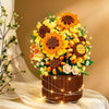 A bouquet of DIY rose and sunflower building blocks in warm orange and yellow tones