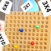 An innovative multiplication board game featuring a grid and numbered tiles, with dice and game pieces displayed on a green s