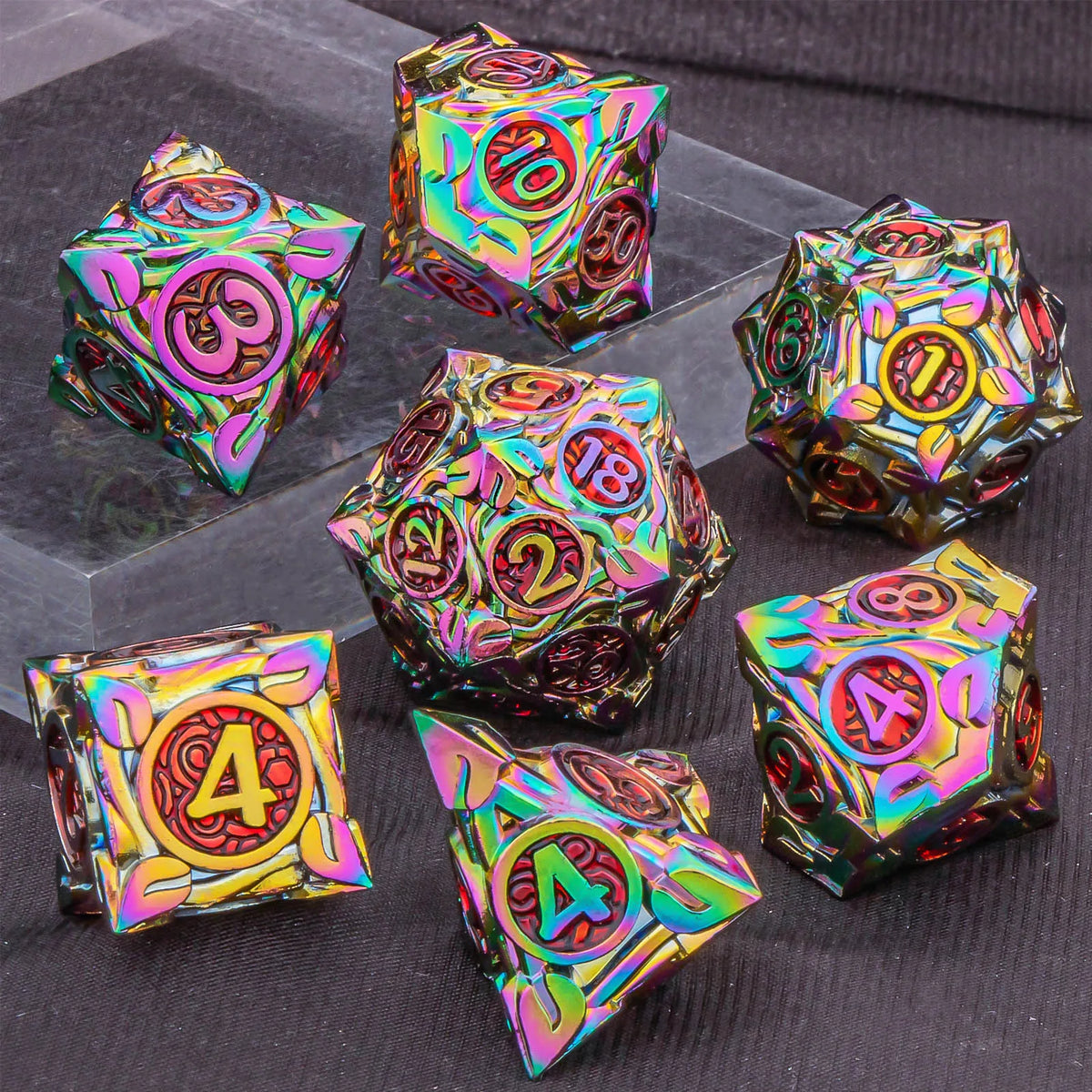 A set of ten iridescent, geometric dice made of metal alloy with numbers and symbols for tabletop role-playing games