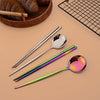 A set of six stainless steel Korean dinnerware including chopsticks and spoons is displayed on a light background.