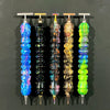 A display of colorful diamond painting pens with stainless steel tips, showcasing various iridescent and vibrant colors.