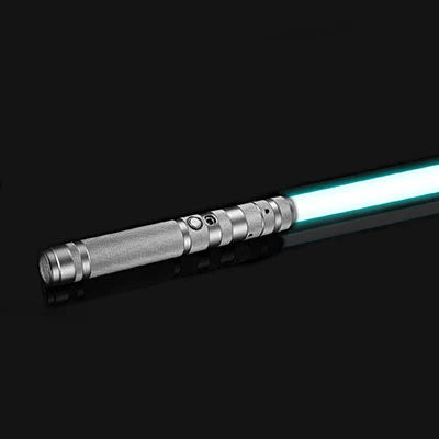 A close-up view of an RGB metal lightsaber with a glowing blue blade and a silver handle against a black background.