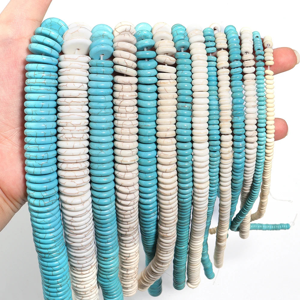 A collection of natural turquoise and white stone beads strung together for jewelry making