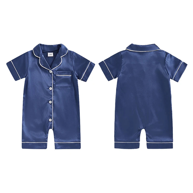 A navy blue satin button-up romper sleepwear for toddlers shown from the front and back.