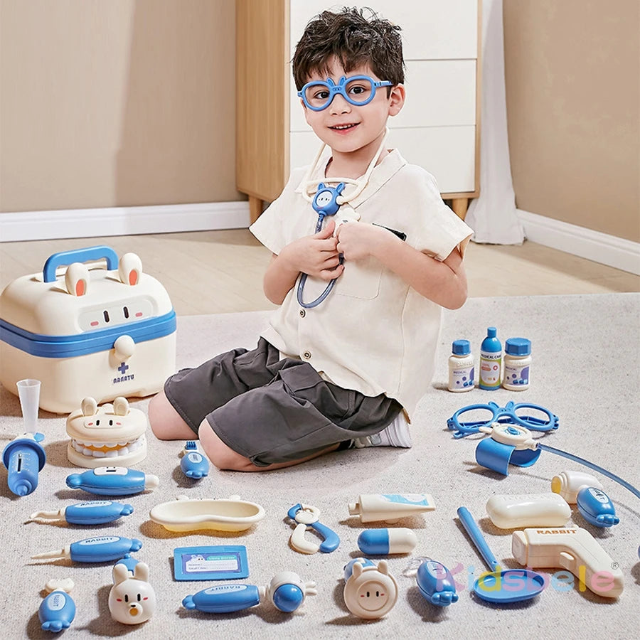 A child is holding a kids doctor play set with various medical tools and a stethoscope on a light-colored carpet.