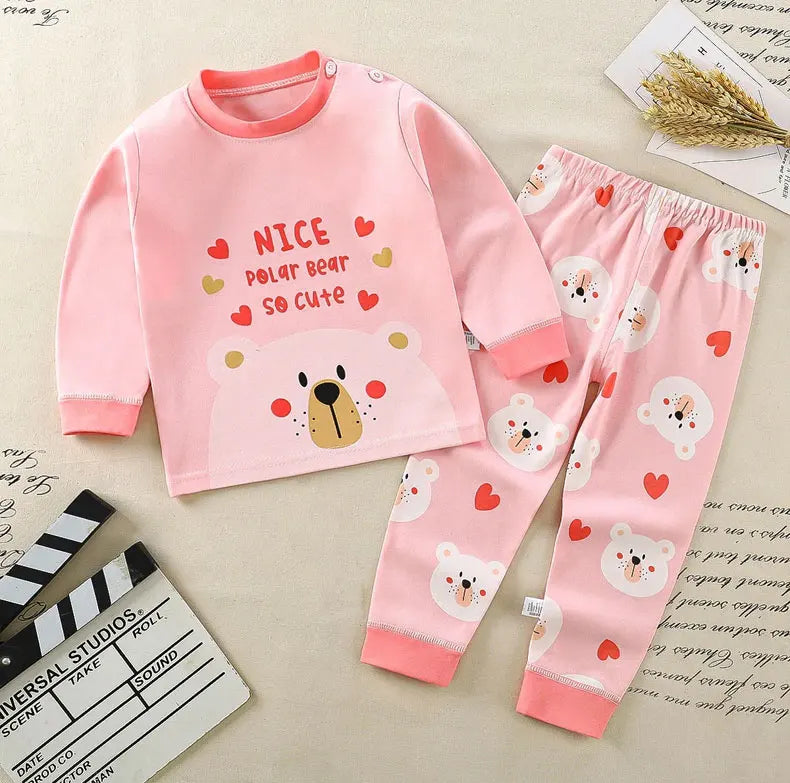 Pink kids' cartoon cotton pajama set with a polar bear design featuring long sleeves and matching pants