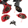 Close-up view of red and black nylon portal axles with gears and mounting hardware.