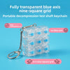 A portable decompression test shaft keychain featuring a fully transparent blue axis nine-square grid.