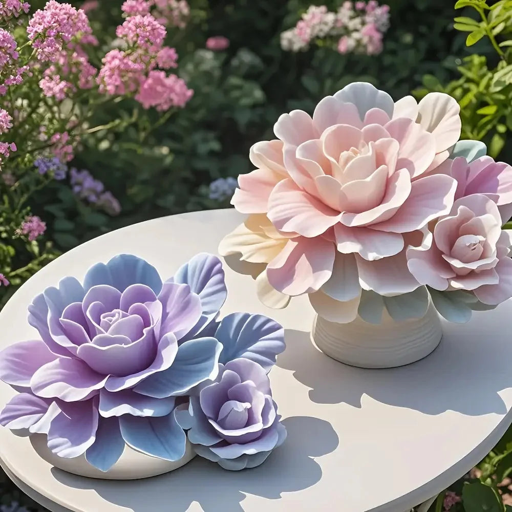 A cluster of pink and lavender floral silicone molds for candles, soap, and clay crafts displayed on a white table.