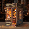 A detailed wooden miniature kit of a magic wand shop display featuring glass cabinets and antique-style decor.