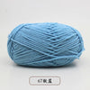 A ball of light blue pre-dyed milk cotton yarn used for knitting and crochet.