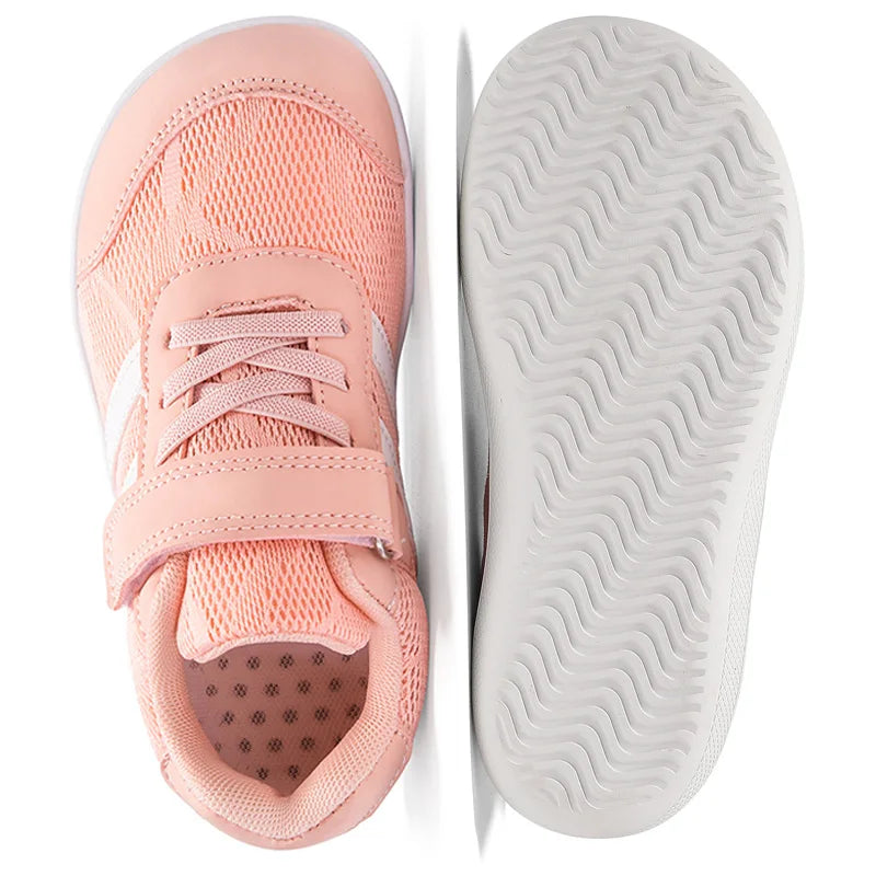 Pink kids' minimalist barefoot sneakers showing the upper and sole views