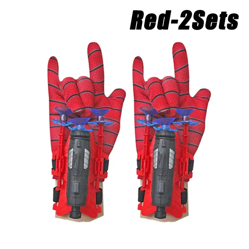 A pair of red superhero spider launcher gloves with suction cup projectiles.