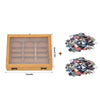 Wooden bookshelf decor with a clear compartment and a pile of mini fidget books