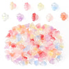 A pile of 50 clear and colored cherry blossom flower glass beads for jewelry making