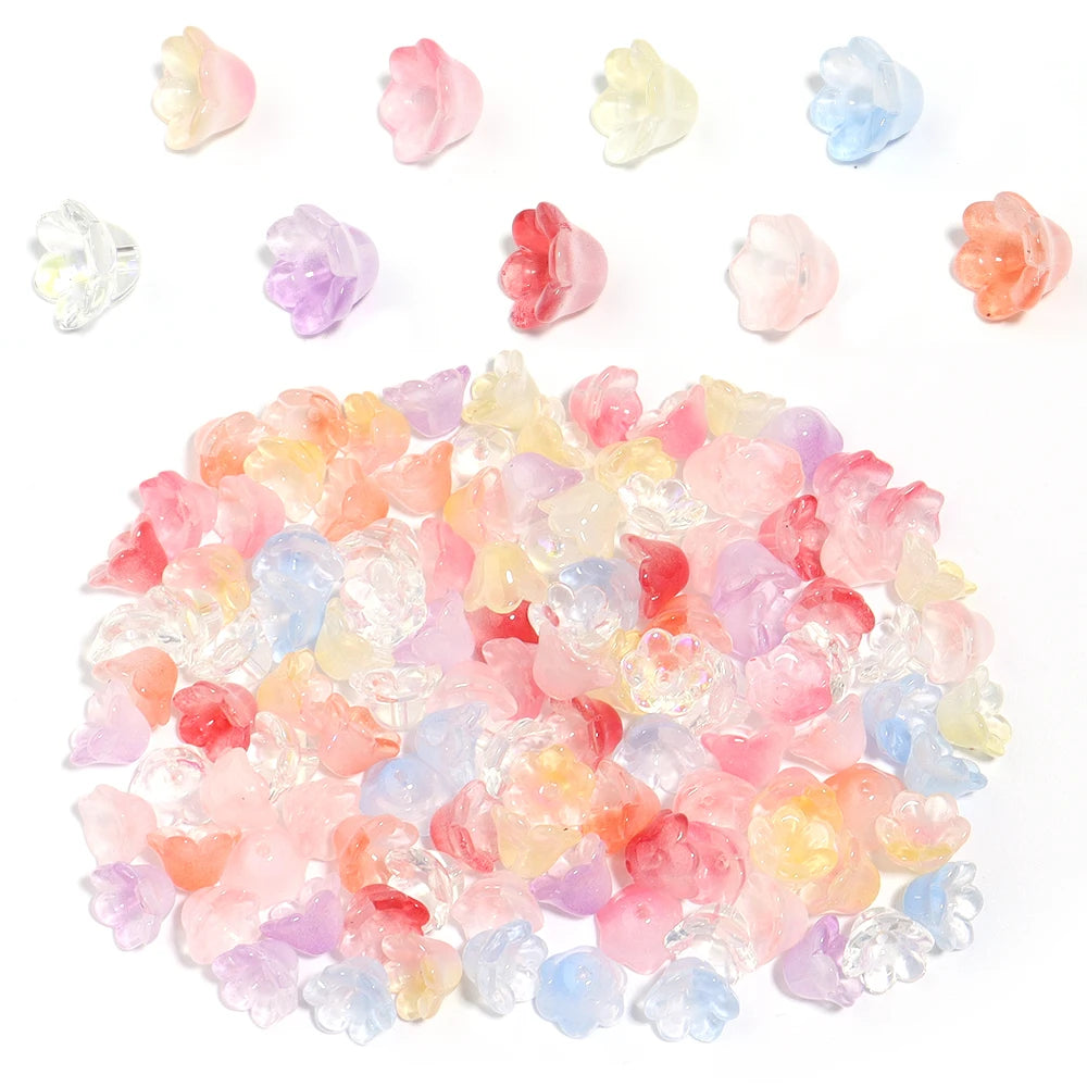 A pile of 50 clear and colored cherry blossom flower glass beads for jewelry making