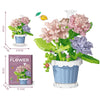 Building block flower bouquet kit showing pink and purple flowers in a blue pot