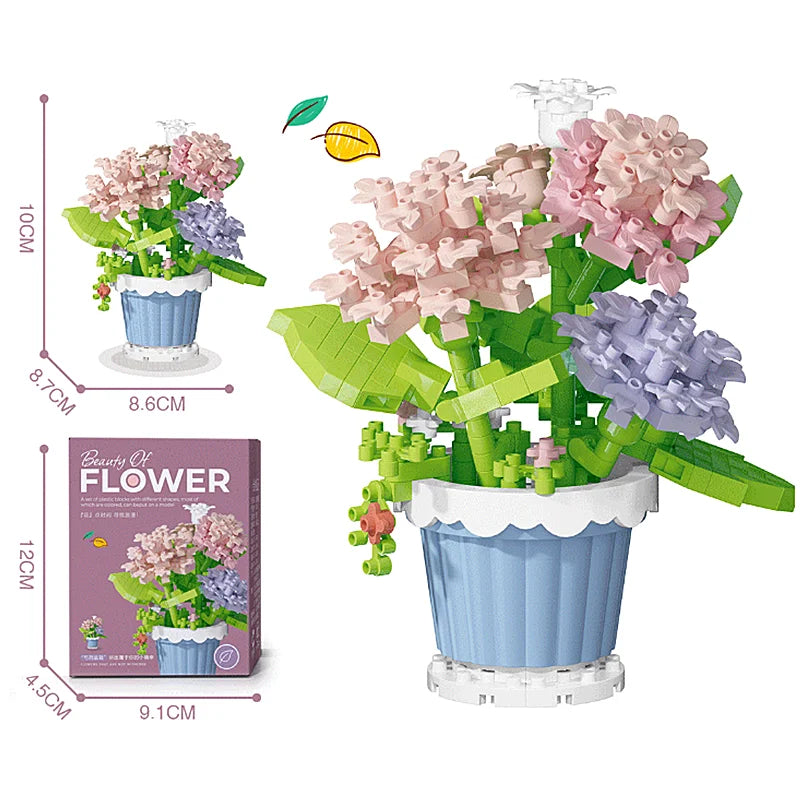 Building block flower bouquet kit showing pink and purple flowers in a blue pot
