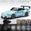 A light blue racing sports car model alongside various accessories like a remote controller and battery.