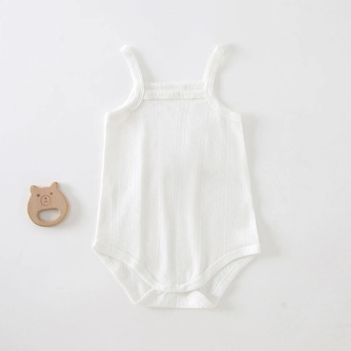 White lightweight cotton strappy romper for babies