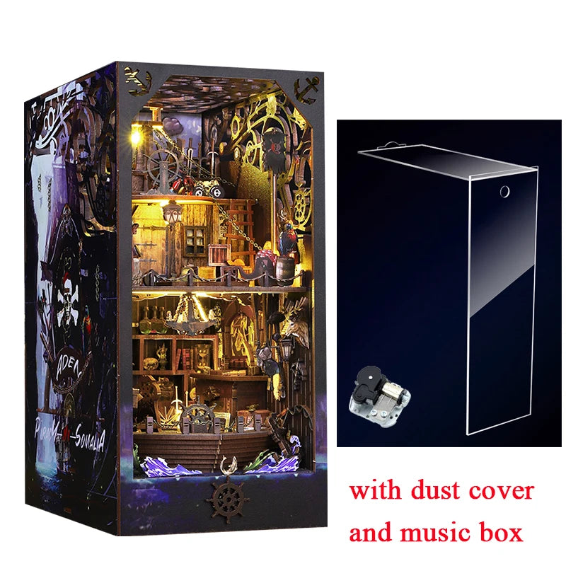 A wooden pirate ship book nook kit featuring a detailed diorama inside a box with a dust cover and music box.