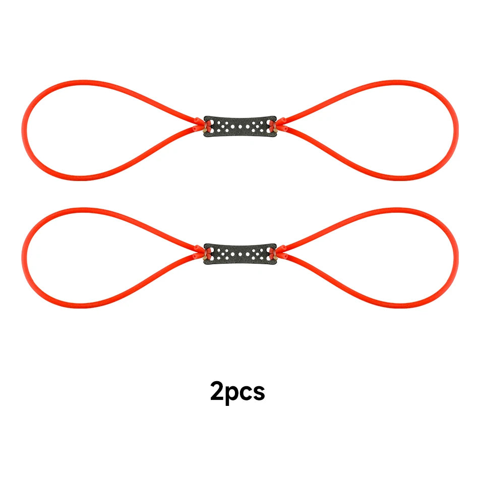 Two bright orange rubber slingshots with black grips are shown.