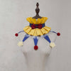 Handmade colorful clown ruff collar with yellow fabric, red bow, and blue trim displayed on a mannequin.
