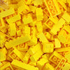 A pile of yellow building blocks for creative DIY projects