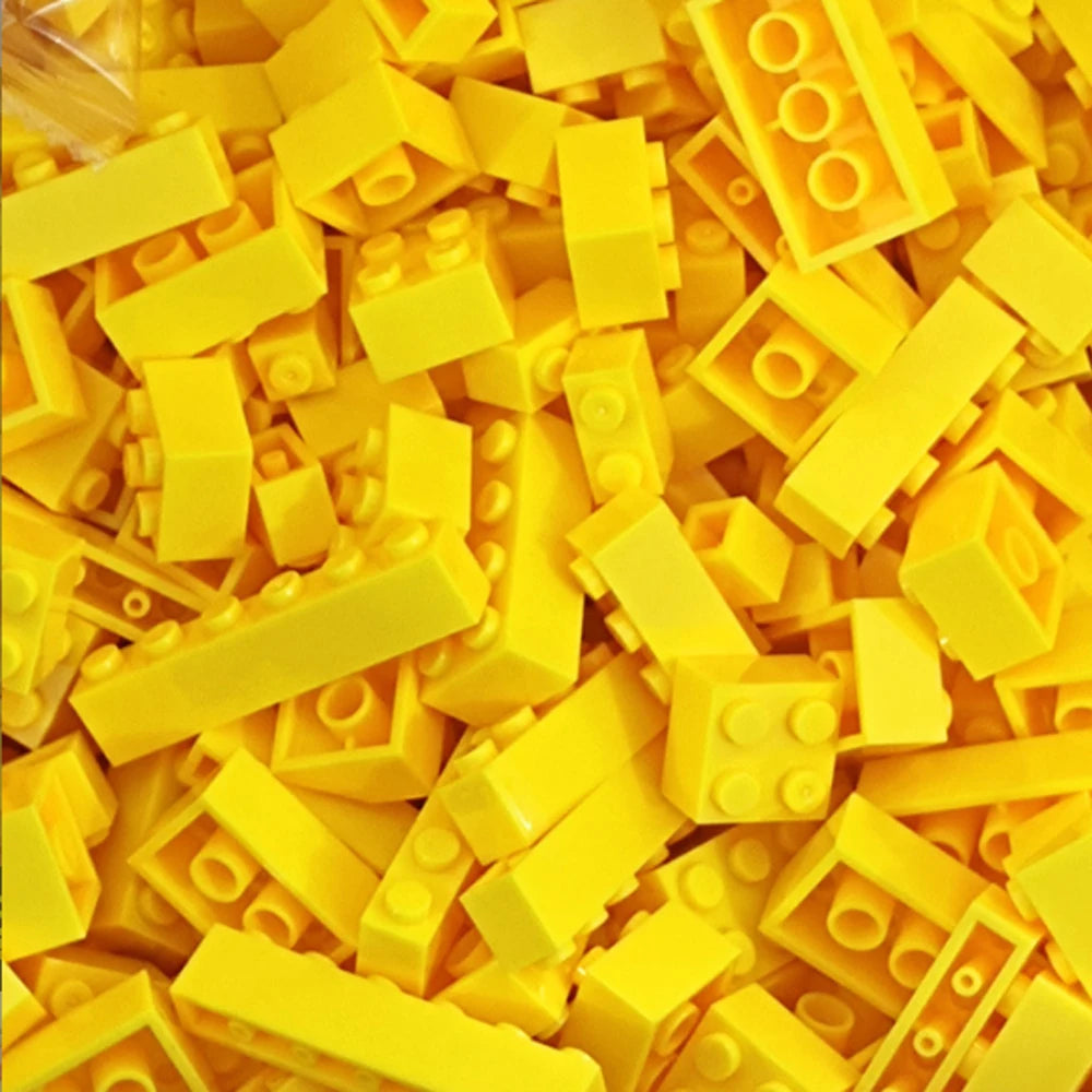A pile of yellow building blocks for creative DIY projects