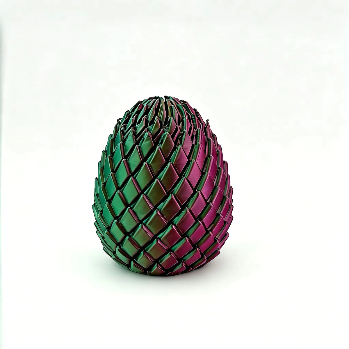 A close-up view of a green and purple textured dragon egg fidget spinner.