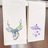 A white heat transfer vinyl featuring a holographic deer head design and the text Merry Christmas with snowflakes.