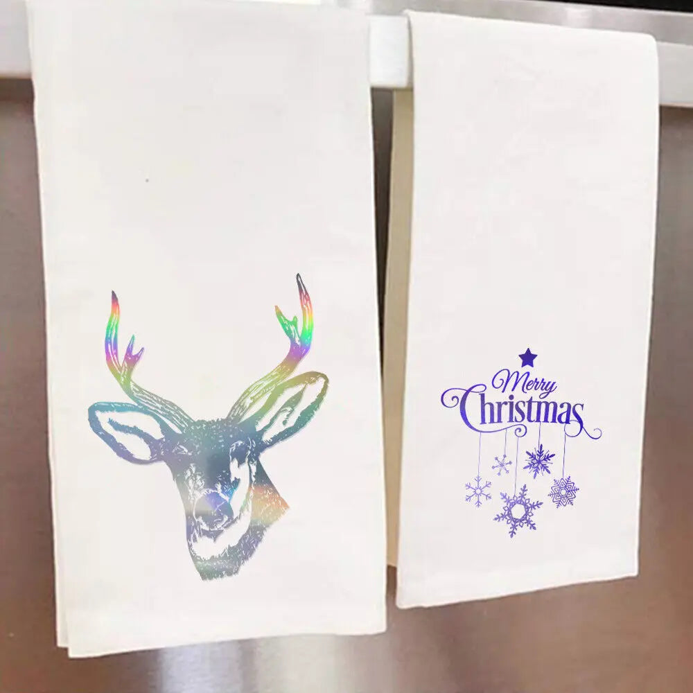 A white heat transfer vinyl featuring a holographic deer head design and the text Merry Christmas with snowflakes.