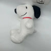 A white plush toy resembling Snoopy with black ears and a red collar is shown against a white background.