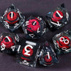 A set of seven liquid core resin polyhedral dice, including a d10, d12, d20, and d40, arranged on a dark surface.