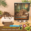 A box of dinosaur skeleton excavation kits showing a reconstructed Stegosaurus fossil and goggles.