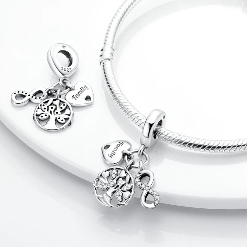 Sterling silver heart charm beads for bracelets featuring a tree design and the word family