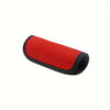 Red neoprene luggage handle cover with a cushioned grip.