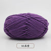 Purple pre-dyed milk cotton yarn in a skein for knitting and crochet