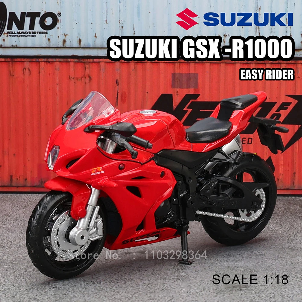 A red Suzuki GSX-R1000 motorcycle model in 1:18 scale displayed against a background featuring the Suzuki logo.