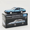 Tomica Nissan Fairlady Z (Z31) die-cast model car in light blue on a black box.