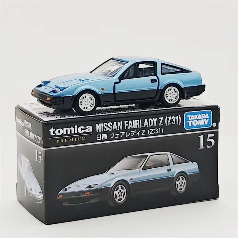 Tomica Nissan Fairlady Z (Z31) die-cast model car in light blue on a black box.