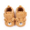 Pair of cute bear design baby prewalker shoes with soft anti-slip soles in a light brown color.