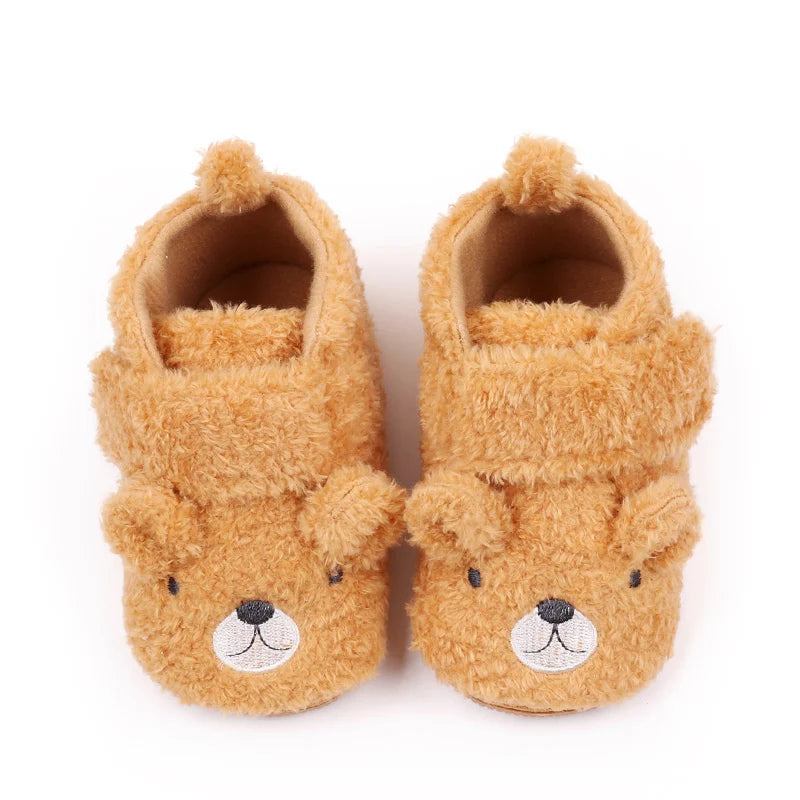 Pair of cute bear design baby prewalker shoes with soft anti-slip soles in a light brown color.