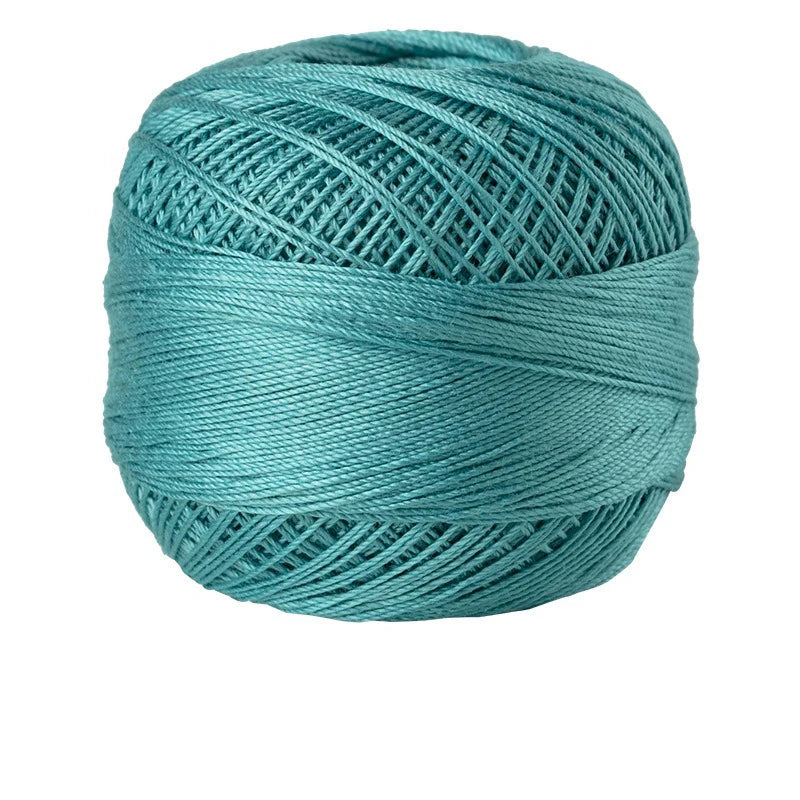 A ball of teal green 100% cotton crochet thread for tatting and embroidery.