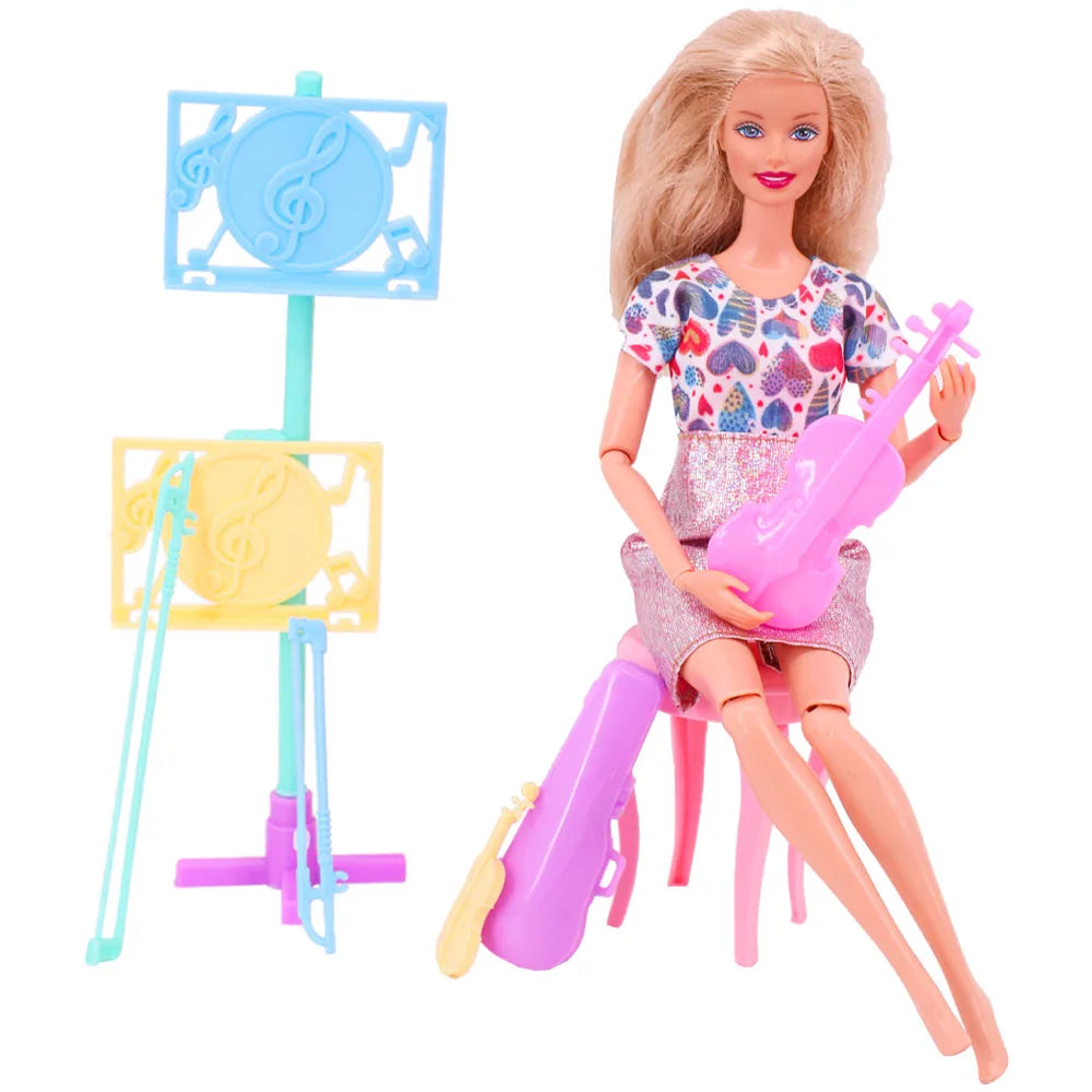 A doll with blonde hair is seated on a pink chair holding a pink guitar and next to a blue and yellow musical instrument set.