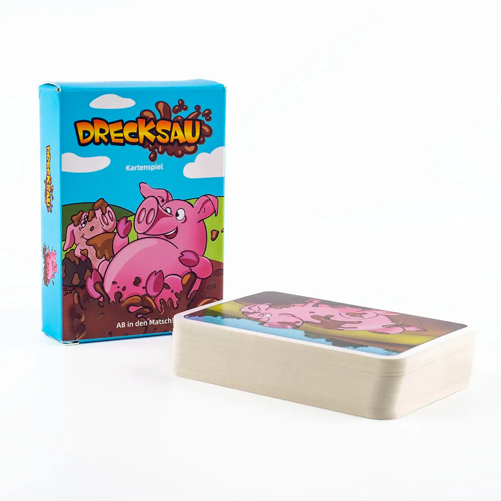 A box of the Drecksau card game featuring a pink pig character.