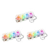 A set of illuminated stress-relief keychain toys featuring colorful keyboard buttons.