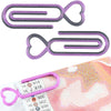 A set of two purple and gray heart-shaped clips used for diamond painting canvas